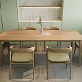 Wooden Dining Table Set With Six Light Green Cushioned Chairs And Marble Shelf Decor