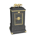Vintage Black Safe With Gold Accents And Decorative Statue On Top