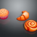Freshly Baked Assorted Pastries Including Cupcake Croissant And Cinnamon Roll