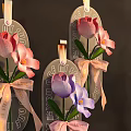 Hanging Glass Tag Vase Flowers with Pink Purple Blooms and Decorative Pink Bows