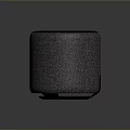 Modern Cylindrical Computer Speaker With Textured Fabric Body And Dark Green Top Surface