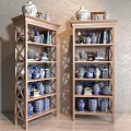 Light Wooden Display Shelves With Blue And White Porcelain Books And Decorative Items