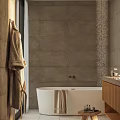 Modern Bathroom Interior with Gray Tiled Walls White Bathtub Hanging Robe Wooden Vanity Mosaic Shower