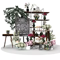 Garden Decor Display With Various Flowers Potted Plants Vases Wooden Shelves And Chalkboard