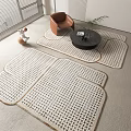 White Woven Square Rugs With Brown Border In Living Room With Coffee Table And Chair