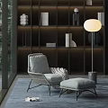 Cozy Wicker Lounge Chair With Gray Cushion Throw Blanket Ottoman And Floor Lamp By Bookshelf