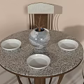 Modern Round Dining Table Set With Patterned Top Four Wooden Leg Chairs And White Bowls