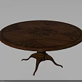Classic Wooden Round Table With Patterned Tabletop And Intricate Carved Legs