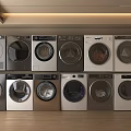 Various Washing Machine Models With Different Colors Styles Neatly Arranged In Indoor