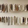 Hanging Clothes On Hangers In Two Layers On Light Wall With Various Colors And Styles