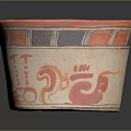 Traditional Ancient Pottery Sculpture With Red Orange Decorations And Intricate Colorful Patterns