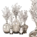 Collection of Glass Vases With Decorative Flowers In Different Sizes For Home Decor
