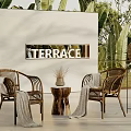 Wicker Outdoor Chairs With Small Wooden Table Vase And Green Plants In Terrace Setting