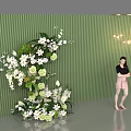 Elegant Floral Installation with Green Vertical Striped Wall White Green Flowers and Decorative Lights