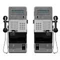 Silver Metallic Public Payphones With Display Screens Keypads Handsets And Coin Slots
