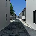 Ancient Architecture Alley With Stone Paved Path White Walls And Windows