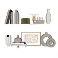 Stylish Ornamental Decor Collection With Vases Picture Frames Books And Leaf Pattern Artwork