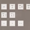 White Switch Panels With Various Sockets And Switch Combinations On Wall