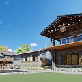 Rural Traditional Guesthouse Architecture with Wooden Balcony Stone Walls and Courtyard Water Wheel