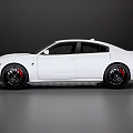 White Sporty Sedan With Black Wheels Red Brake Calipers And Aerodynamic Design