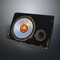 Black Audio Speaker With Orange JBL Logo And Worn Exterior Design