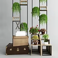 Indoor Green Plant Decor With Hanging Plants Shelves Wooden Chest Red Flowers And XA Sign