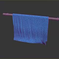 Blue Soft Towel Hanging On Metal Rod For Daily Household Use