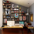 Stylish Home Office Studio With Bookshelves Wall Hangings Posters And Decorative Art