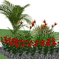 Lush Garden Plant Combination with Palm Leaves Orange Flowers Red Roses Grass and Pebbles