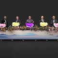 Ceremonial Launch Device Featuring Five People Decorative Flowers Wavy Pattern Tabletop and Wheels