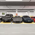 Indoor Parking Garage Featuring Multiple Luxury Cars Parked On Yellow Marked Floors With Bright Lighting
