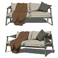 Minimalist Light Green Two Seater Sofa With Linen Upholstery White Cushions Gray Pillows And Brown Blanket