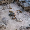 Active Demolition Site With Multiple Excavators Working Amidst Building Rubble And Debris 3d model