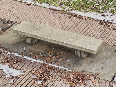 Outdoor Concrete Bench On Brick Pavement With Fallen Leaves And Snow Patches 3d model