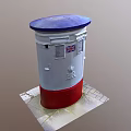 Traditional Postbox With Blue Lid White Body Red Base On Stone Pavement