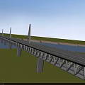 Modern Steel Truss Bridge With White Pylons Over River And Green Grass