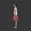 Little Girl Standing in White Top and Red Plaid Skirt on Gray Background with Sandals