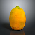 Ripe Yellow Papaya With Green Top On Dark Reflective Surface