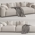 Cozy Beige Double Sofa with Soft Cushions and Black White Striped Blanket