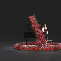 Floral Installation Surrounding Black Piano With Red And Pink Flowers And Woman Standing By
