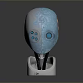 Blue Biomechanical Creature Head With Fetch & Carry Text Intricate Patterns And Silver Base