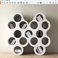 Unique White Circular Hole Bookcase With Books And Robot Models 3d model