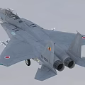 Gray Fighter Jet Flying With Weapons And Landing Gear Down In Blue Sky