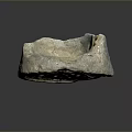 Detailed Circular Stone Sculpture Carved With Intricate Radiating Patterns And Textured Surface