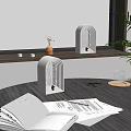 Two Modern Arch Table Lamps with Warm Light by Window on Desk with Book