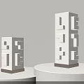 Modern White Table Lamps With Geometric Cut Out Design Dark Base On White Pedestals
