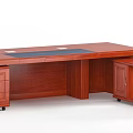 Elegant Wooden Office Desk With Carved Details And Black Writing Pad