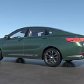 Sleek Green Sedan Showcasing Modern Exterior Design 3d model