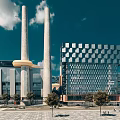 Modern Office Building with Geometric Facade Glass Curtain Wall Tall Chimneys and Plaza Trees