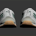 White And Green Striped Sports Shoes With Light Colored Soles And Classic Design